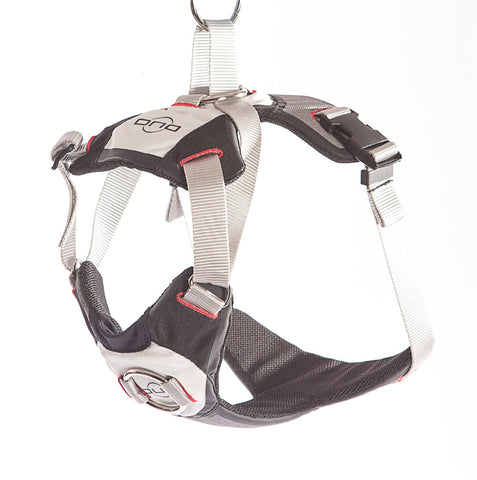 product photo of an original black, white, and red Duo Adapt escape-proof dog harness display floating in a white photo studio background