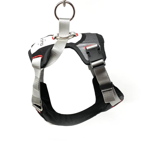product photo of an original black, white, and red Duo Adapt escape-proof dog harness display floating in a white photo studio background from a side view perspective