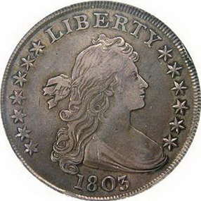 1803 Draped Bust Obverse. Features a profile bust of a woman with draped long hair. There are stars surrounding the face on the left and right side.The coin reads: "Liberty" and "1803"