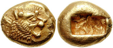 Ancient Lydian Gold Nugget Coin. A profile view of a lion on the obverse and an indent in the reverse side.