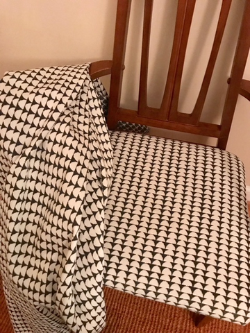Folded Brentwood Textiles over chair