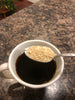 A cup of coffee with maple sugar