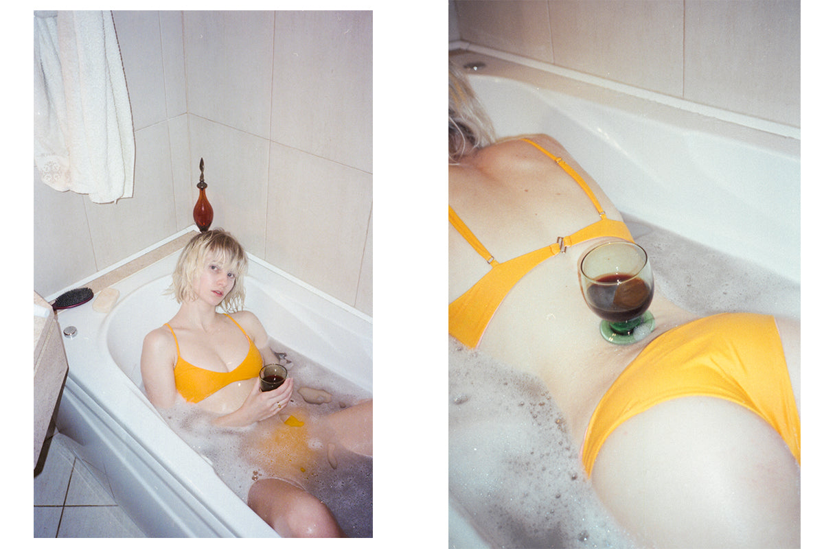 Model in Ozero Swimwear in a bathtub by Jean Amb in Algarve, Portugal
