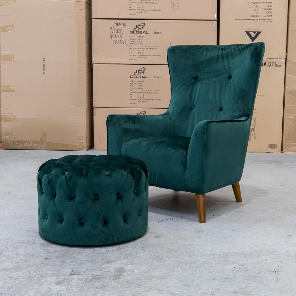 teal armchair with footstool