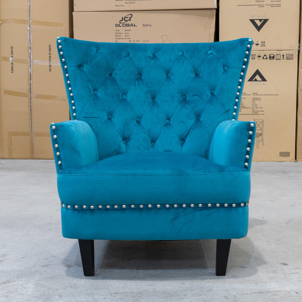 turquoise accent chair in living room