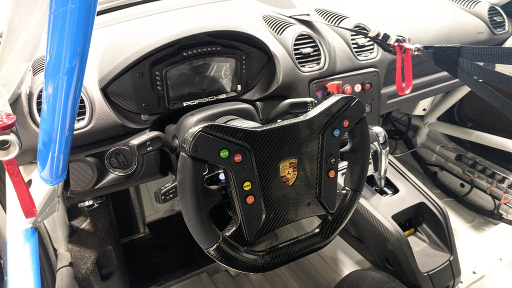 Porsche GT4 Clubsport MR interior, steering wheel, dash