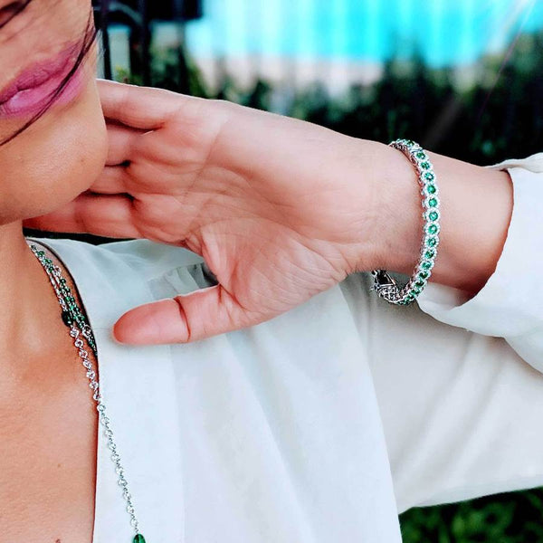 Model wearing Elements Emerald Bangle