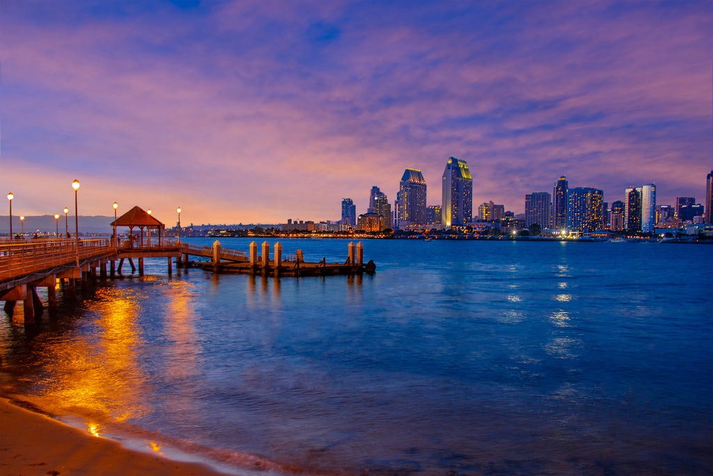 pier in the bay of san diego california at sundown