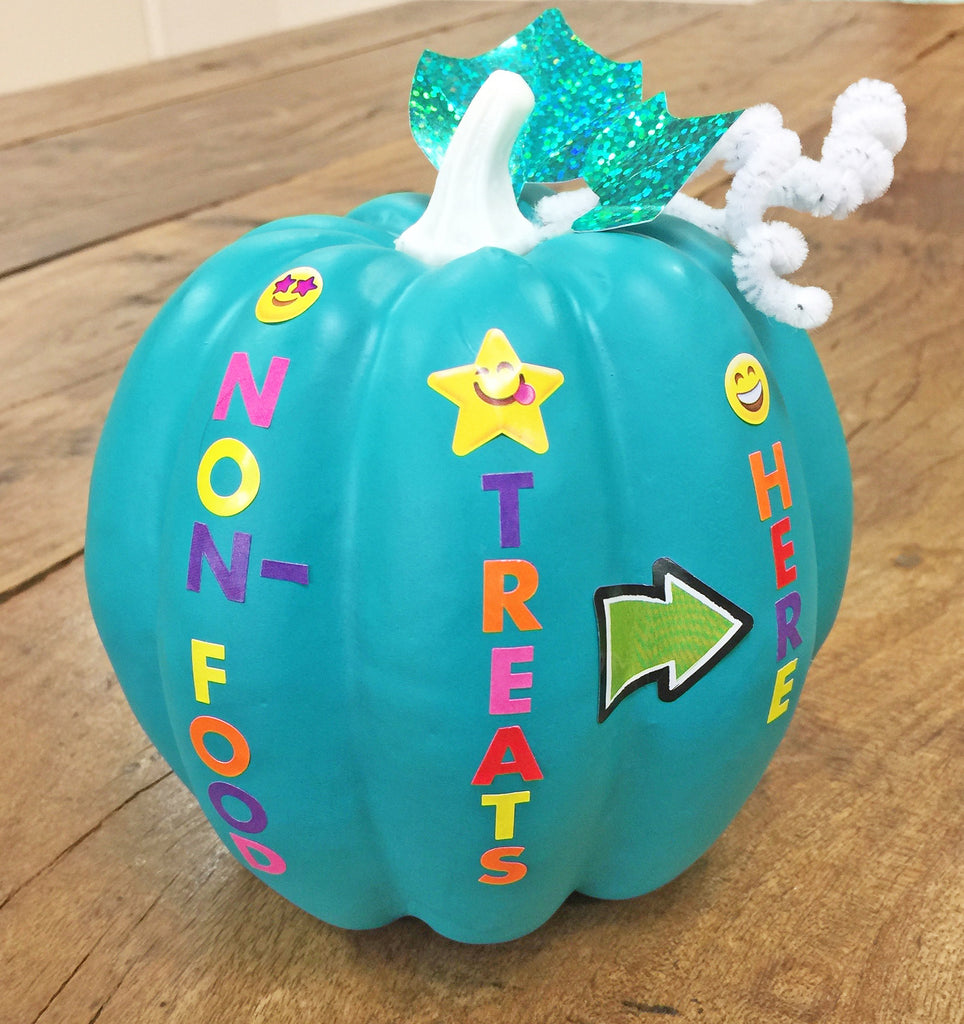teal pumpkin decorated with stickers project non-food treats food allergy friendly door decor halloween
