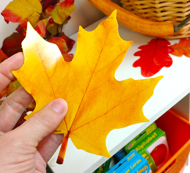 artificial paper fall leaves for halloween, thanksgiving, and fall DIY projects