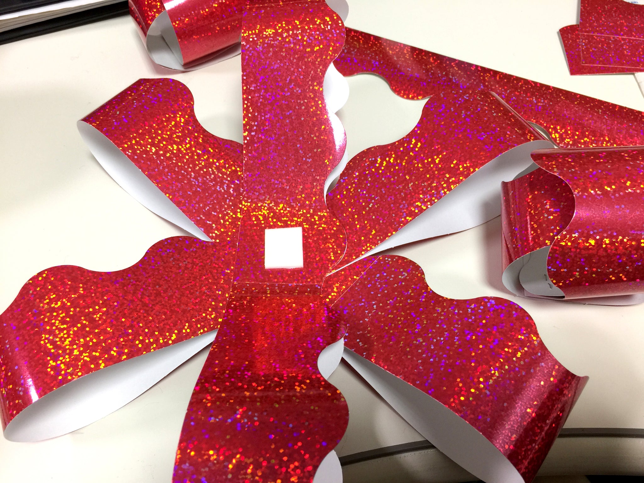 How to make a DIY paper bow for Christmas.