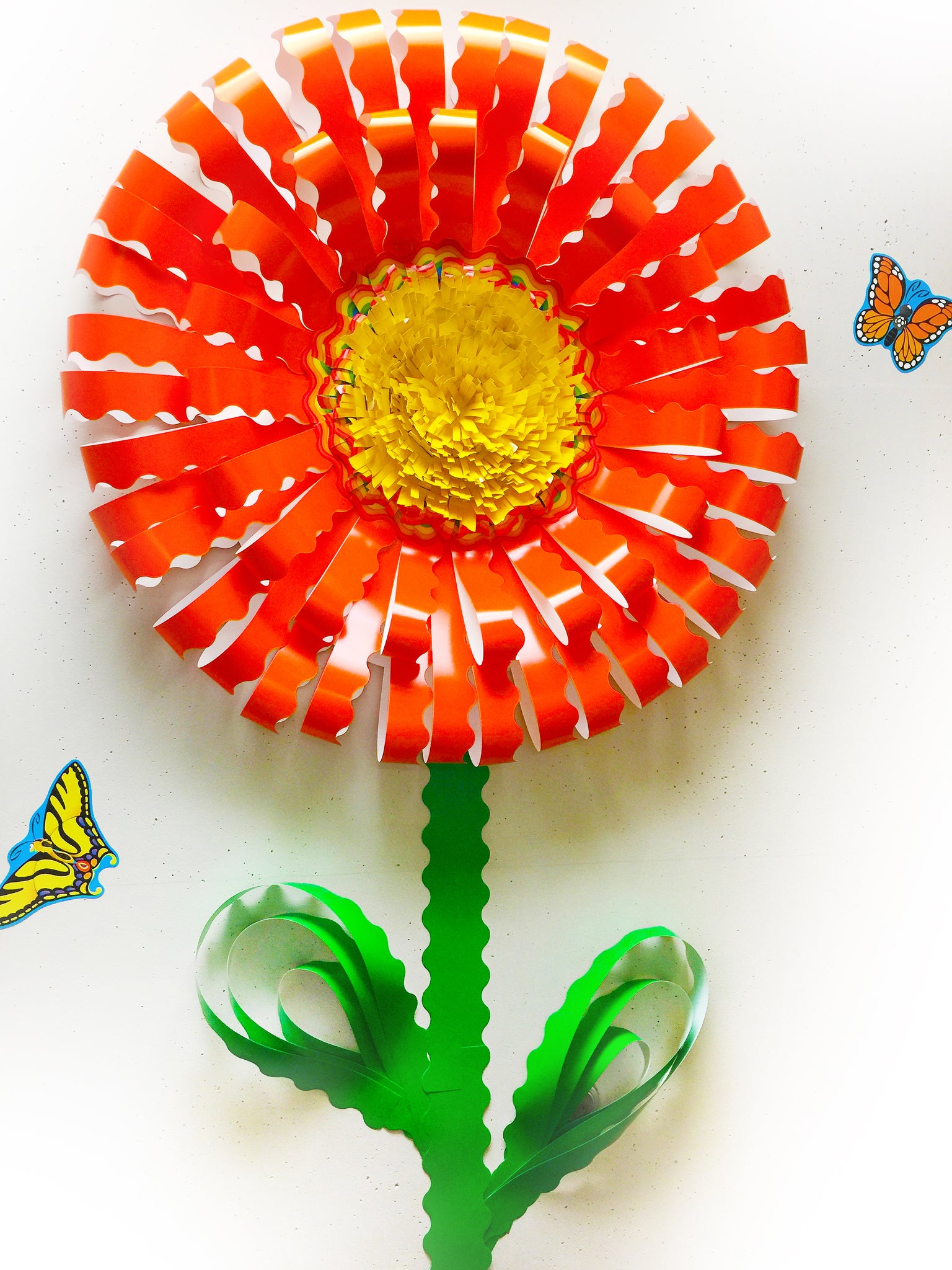 giant paper flower made from bulletin board borders trimmers trend