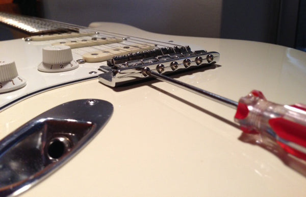 Adjusting Intonation With Screwdriver