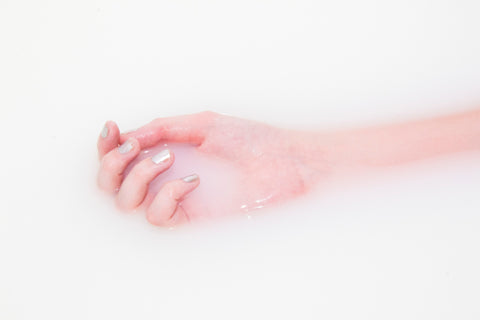 Hand soaking in water