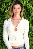 Samantha Lockwood in layered Fleurings necklaces with Fresh orchids
