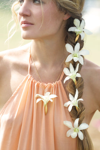 Fleurings vase hairpieces worn with fresh white dendrobium orchids. Ideal hair accessories for Brides, Bridesmaids and Beach Weddings. 