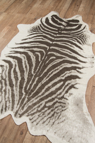 faux fur animal skin area rug in zebra print.