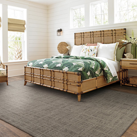 brown rug under tommy bahama bed
