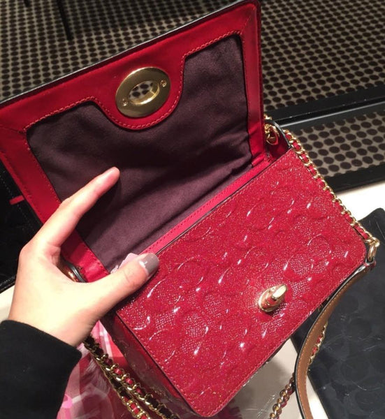 red patent leather coach purse