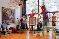 Standing folk art figures in Diego's studio. 