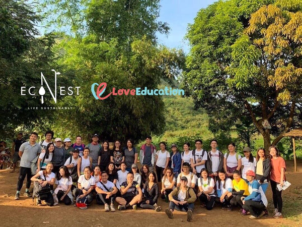 Participants from EcoNest Philippines and Love Education Philippines Future Seeds program smile for the camera at Mount Paliparan Rizal. Group included friends from Love and Light Co, Shangri-La Makati, and Engineering students from De La Salle Dasmarinas.