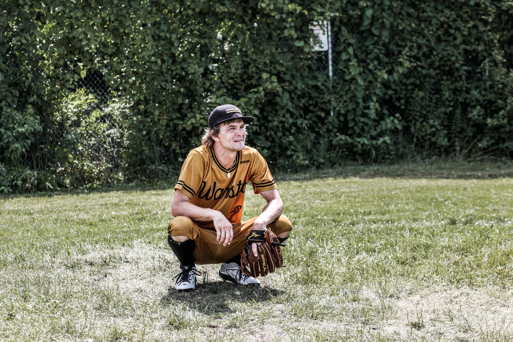 Brendan Benson catching for his son after the game