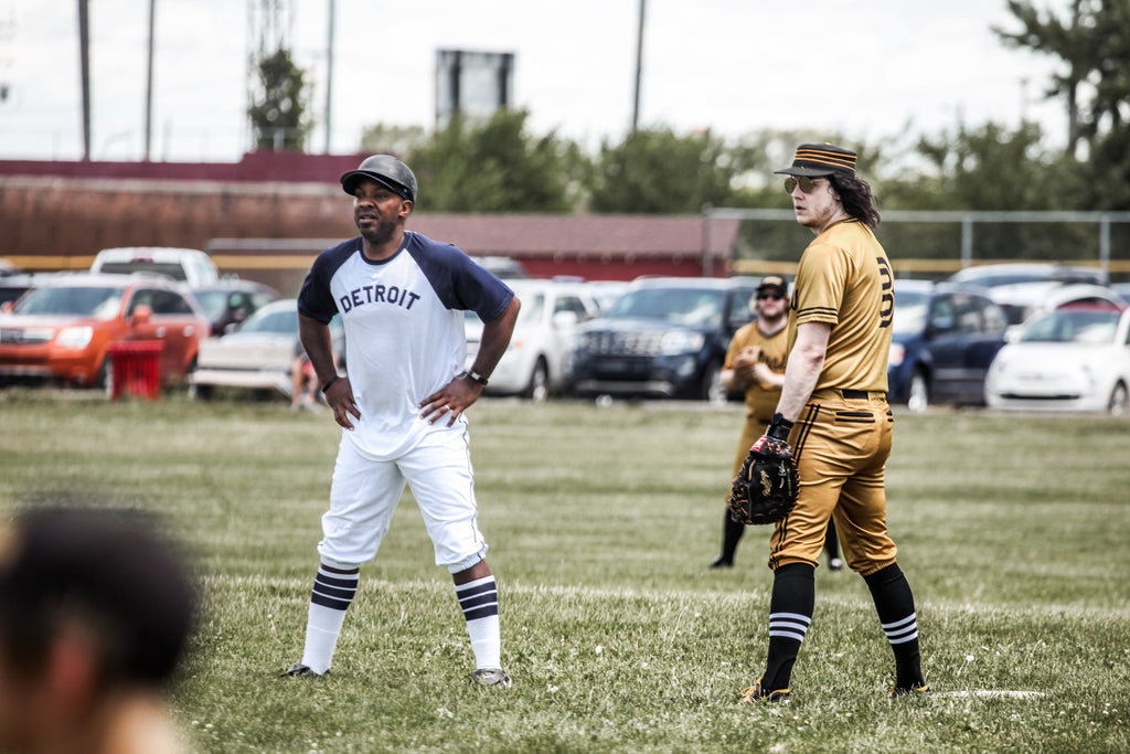 Jack White of the Warstic Woodmen playing first base with a Motor City AllStar runner on