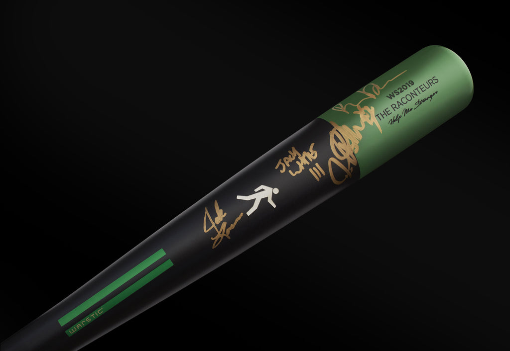 Close up view of the gold autographs on the Raconteurs Special Edition Bat