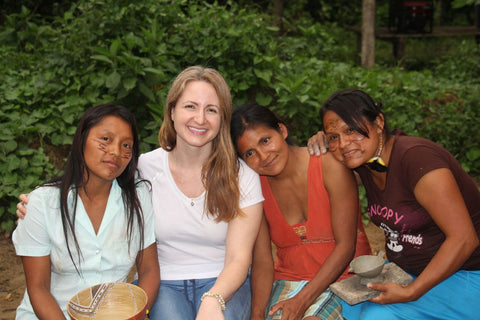 Rahua founder in white with her three rainforest co-workers