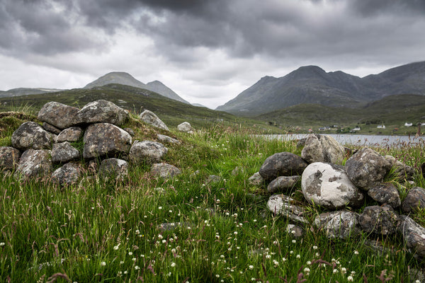 Blackhouse ruins and the Harris hills seen from our cask warehouse site at Ardhasaig.