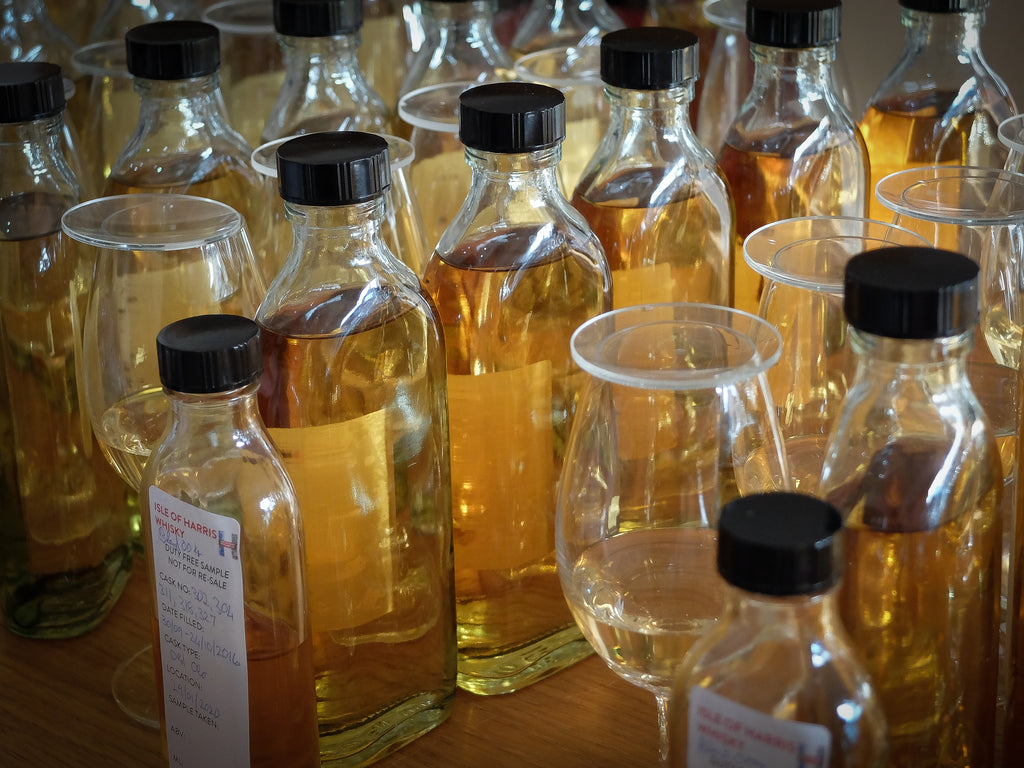 Sample bottles of whisky freshly drawn from the cask.