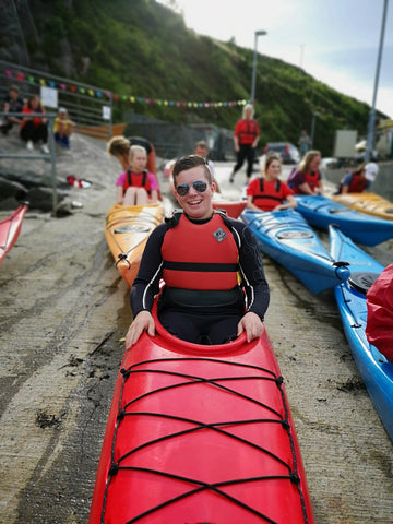 The distillery team get paddling...