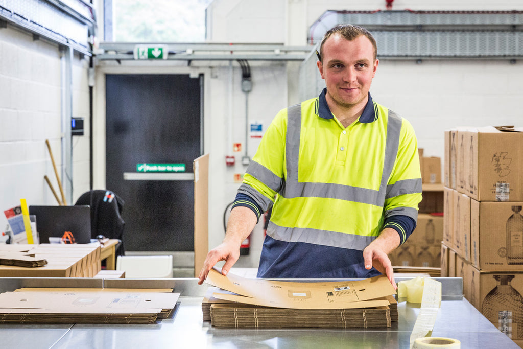 John working in the warehouse in 2017.