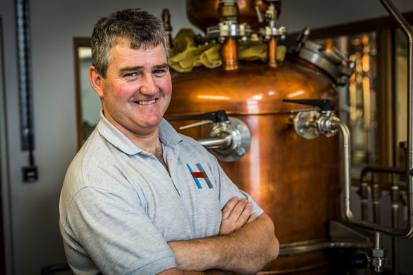 Harris distiller Domhnall at 'The Dottach' gin still.