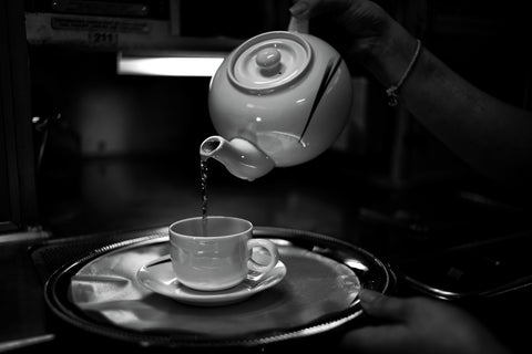 Pouring black tea