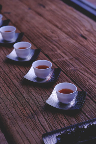 black tea in cups