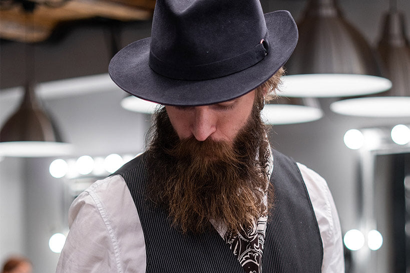 man in hat with a long beard
