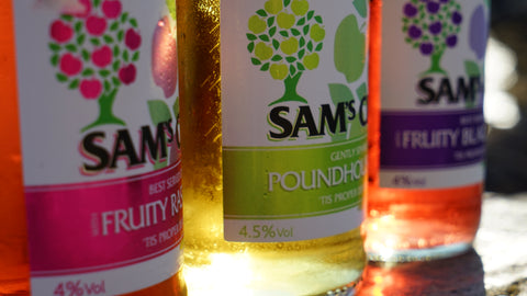 Sam's fruit cider bottles