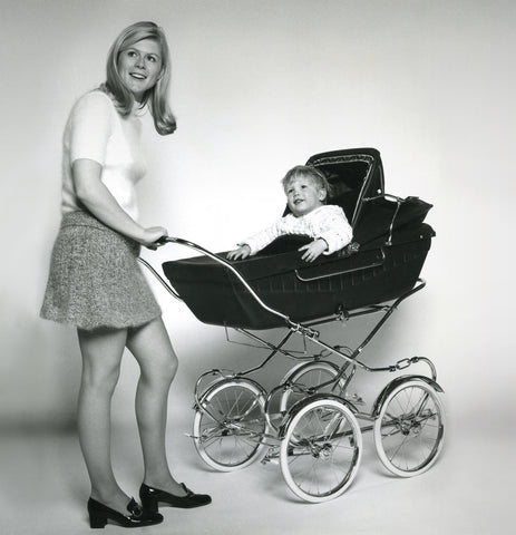 1970s mother with baby in pram