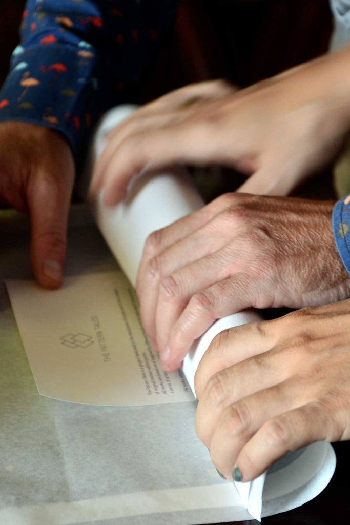 The artists Chiara and Spiros preparing the print for shipping