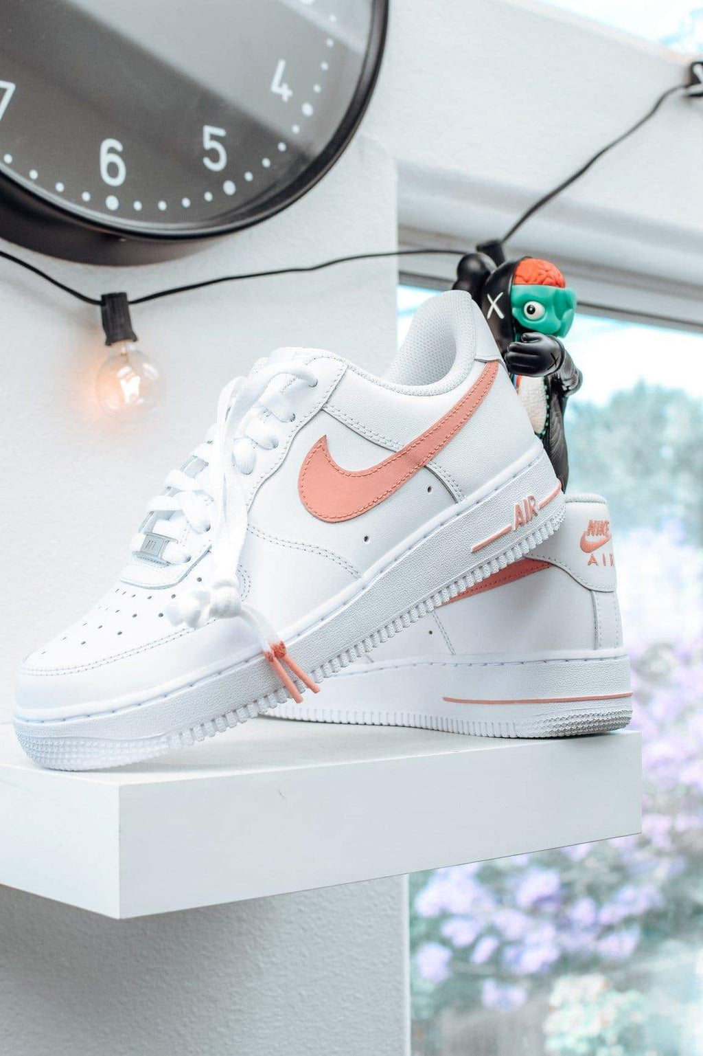 nike air force 1 light pink swoosh