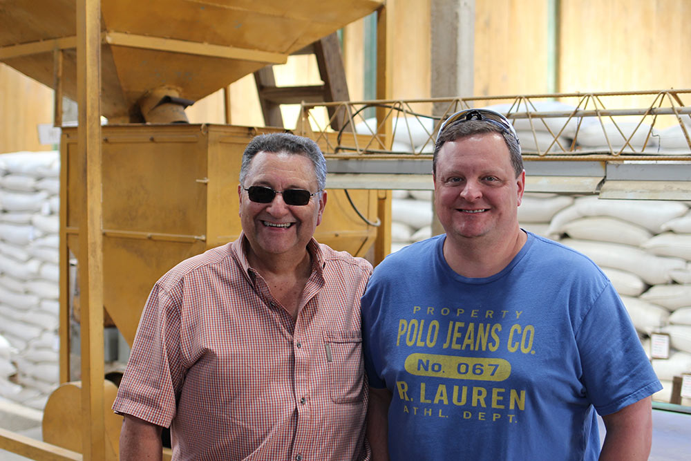 The third and fourth coffee farming generations of the Menendez family: Miguel Sr and his son Miguel.