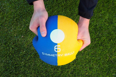 golf symmetry ball hand positioning guide delayed release