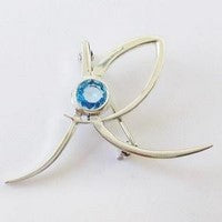 broche argent avec topaze bleue