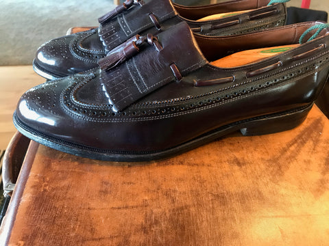 Mirror shined wingtip loafers