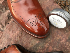 Reflection of Pure Polish High Shine in toe of Mirror Shined Allen Edmonds Walnut Weybridge Oxford Leather Shoes