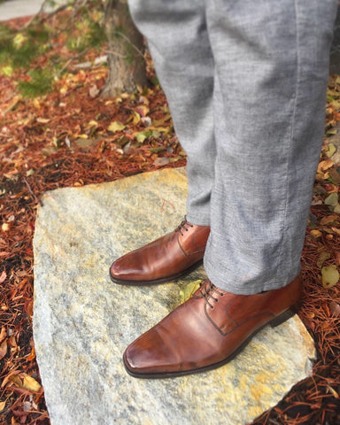 Men's Style Shot - Brown & Grey with Fall Leaves, Magnanni Derbies and Agave Denim Slacks