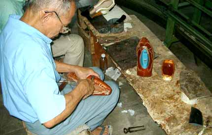 Craftsman making handmade shoes