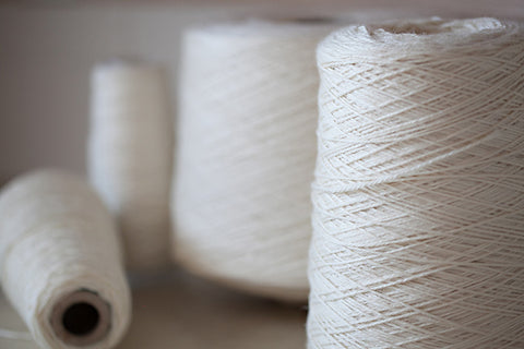 Undyed yarn on cones