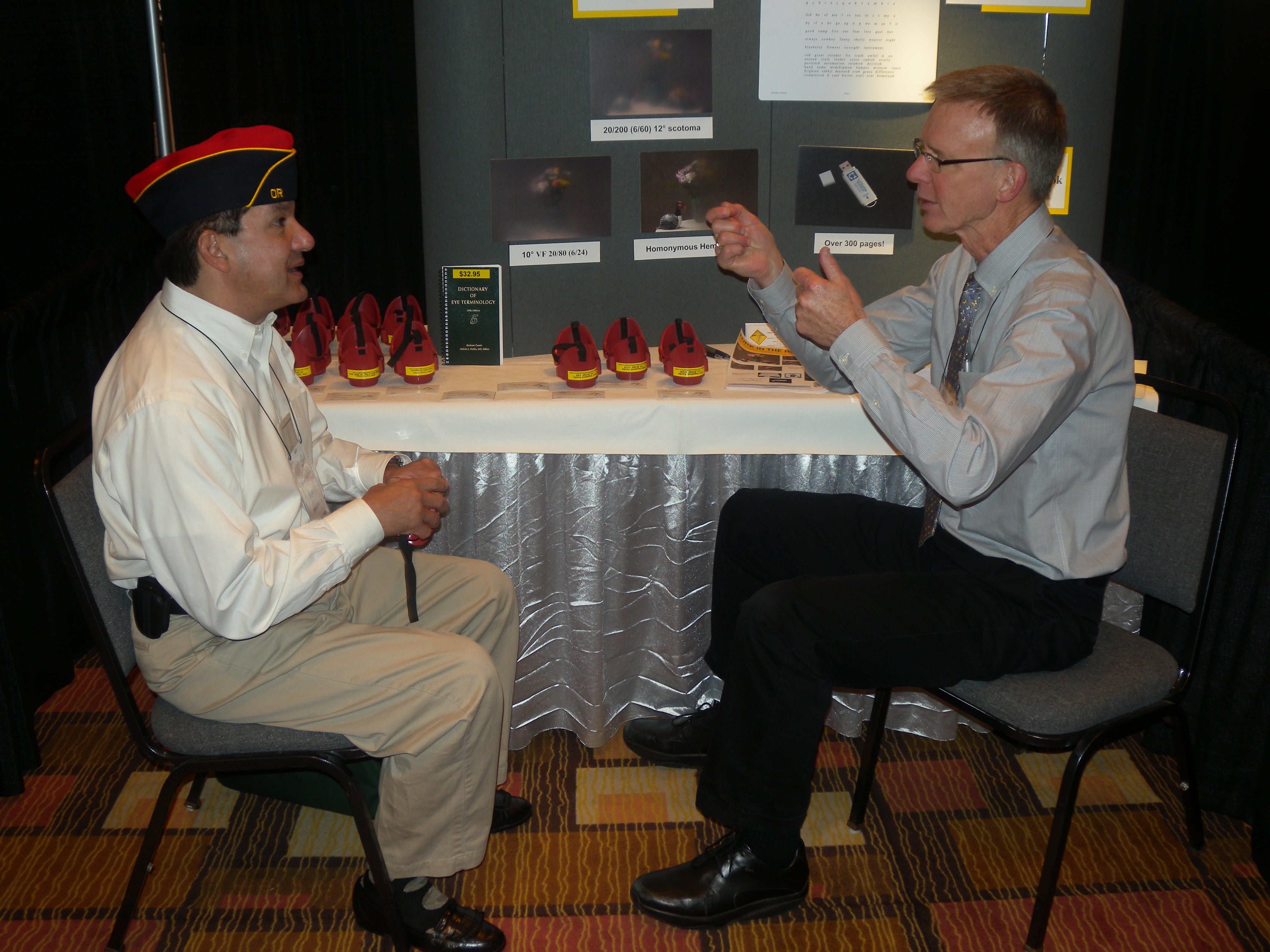 Marshall and Edgar Penaloza at the BVA conference with simulators in the background